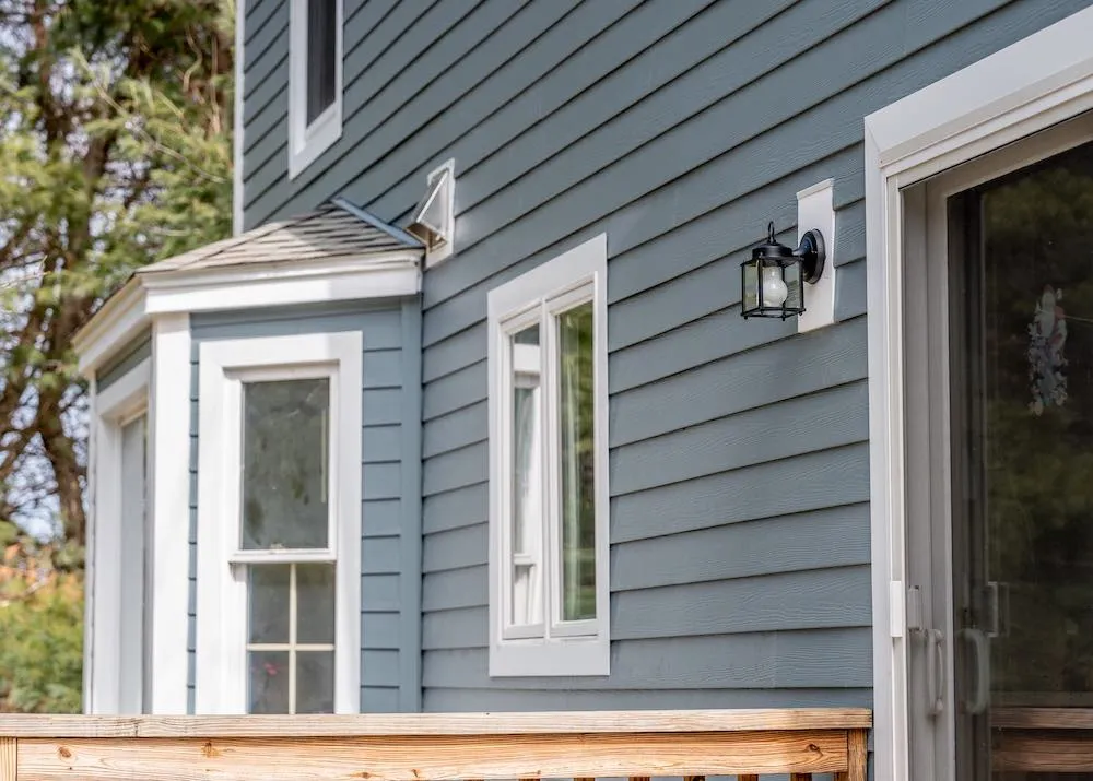 Golden Group Roofing exterior of home with james hardie siding.