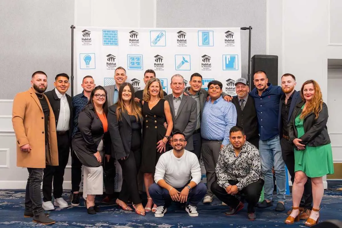 The entire Golden Group Roofing & Solar family at Habitat for Humanity.