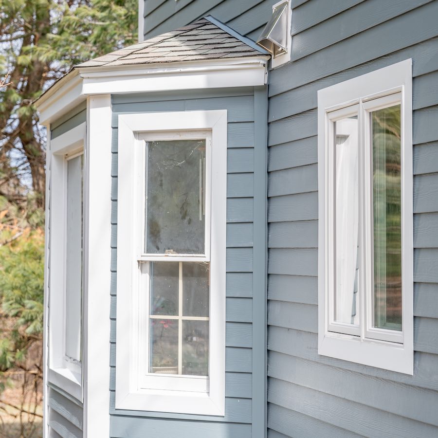 Golden Group Roofing exterior of home with james hardie siding.