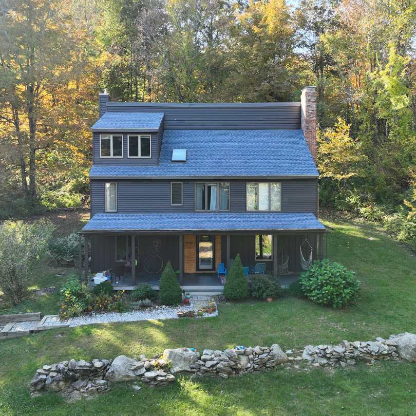 Home with an exterior renovation done by Golden Group Roofing.