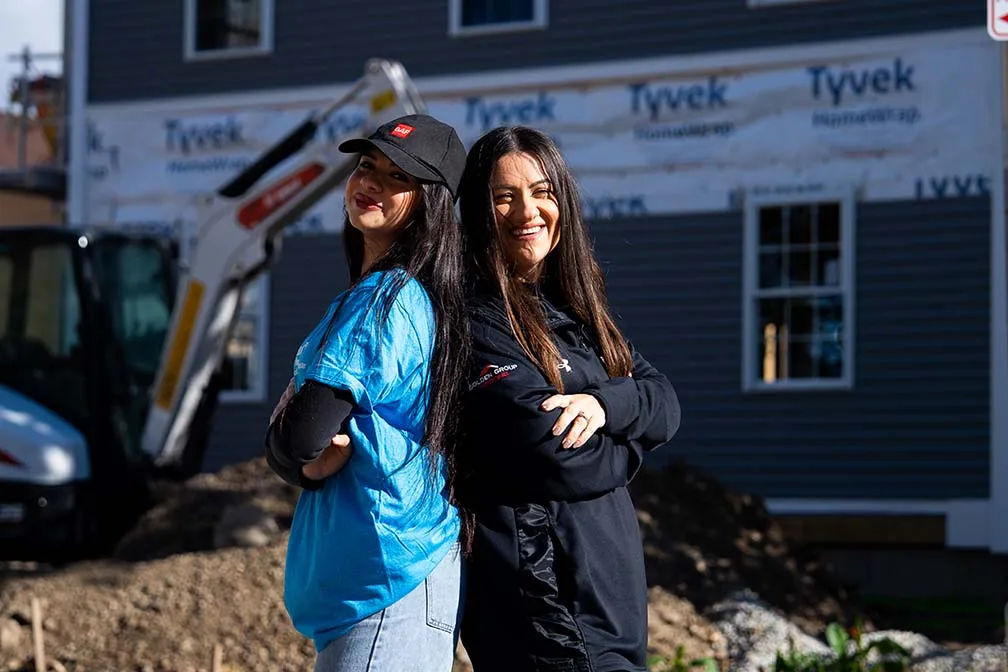Greta and Ciara Bajrami from Golden Group Roofing in Worcester MA Habitat Humanity Truck