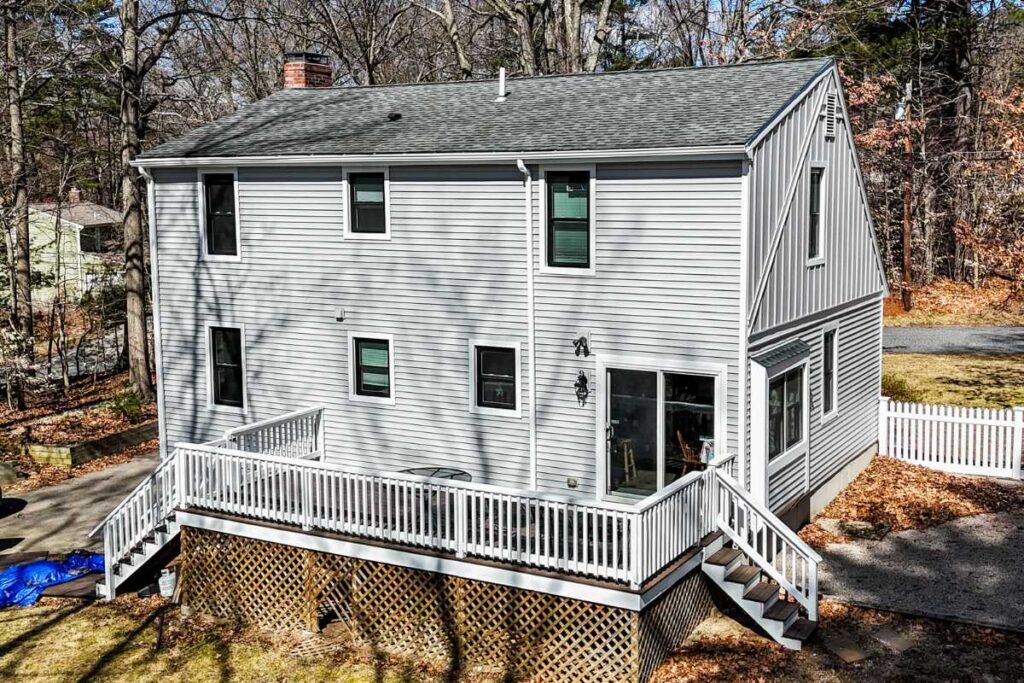 Exterior Renovation with Window replacement done by Golden Group Roofing. Benefits of window replacement with exterior renovation concept.