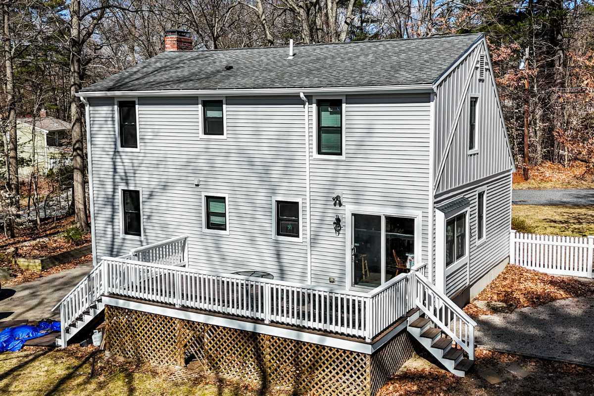 Exterior Renovation with Window replacement done by Golden Group Roofing. Benefits of window replacement with exterior renovation concept.