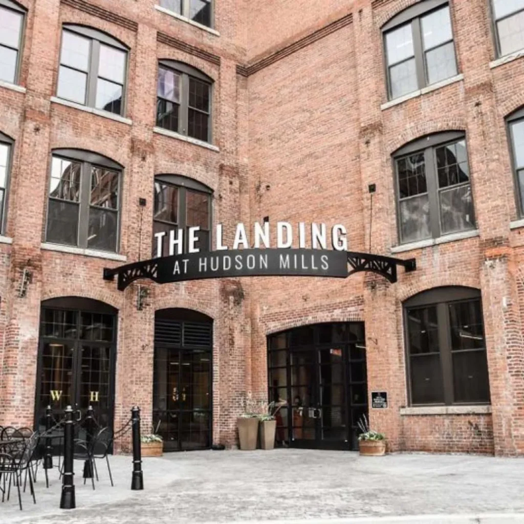 Exterior view of the brick building at The Landing at Hudson Mills