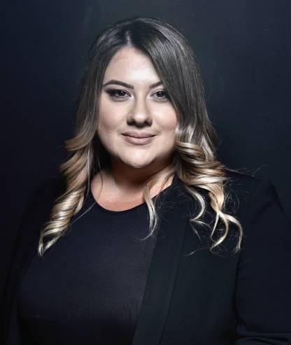 Headshot of Greta Bajrami, CEO of Golden Group Roofing