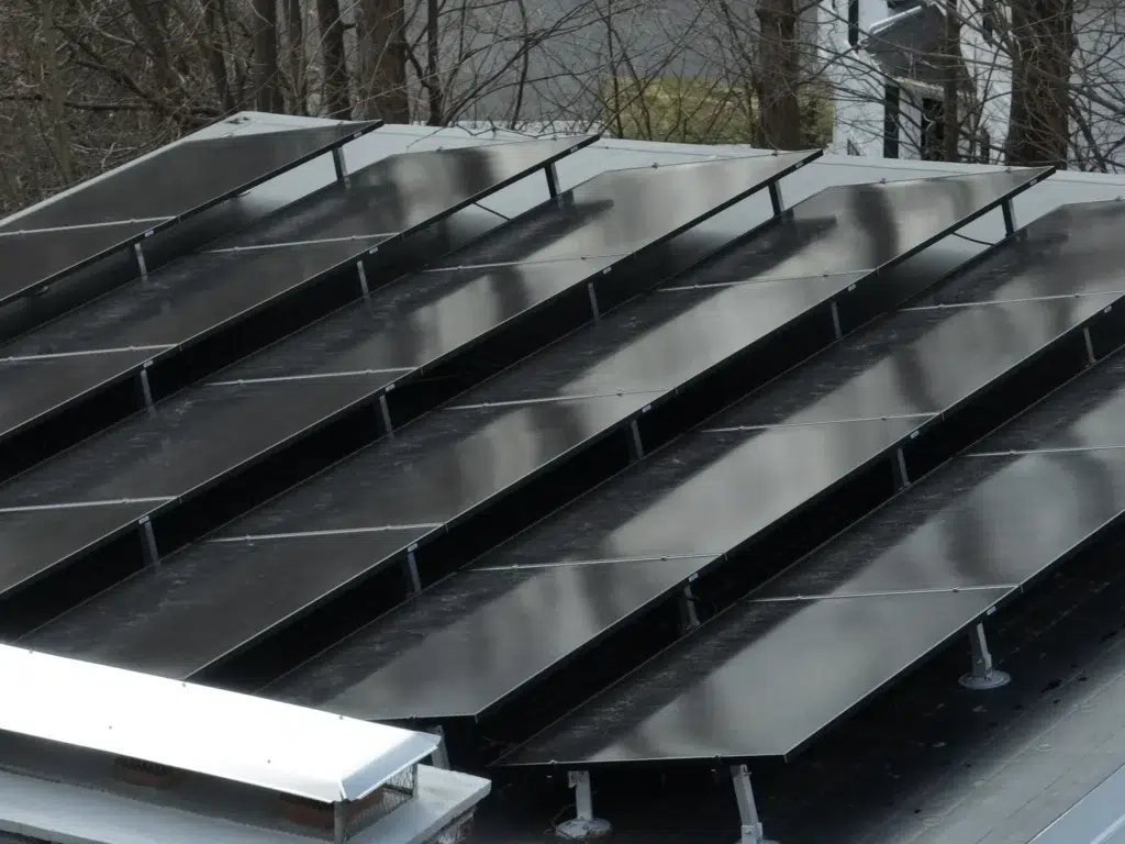 Rooftop Solar Panels on a roof installed in Newton, Massachusetts
