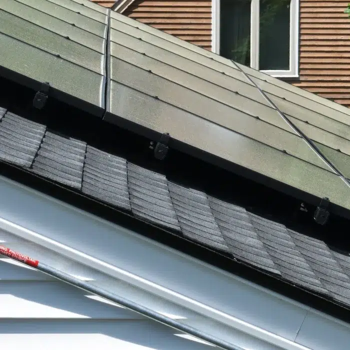 side view of a Solar Panel Installation in Framingham, MA on a slanted residential roof