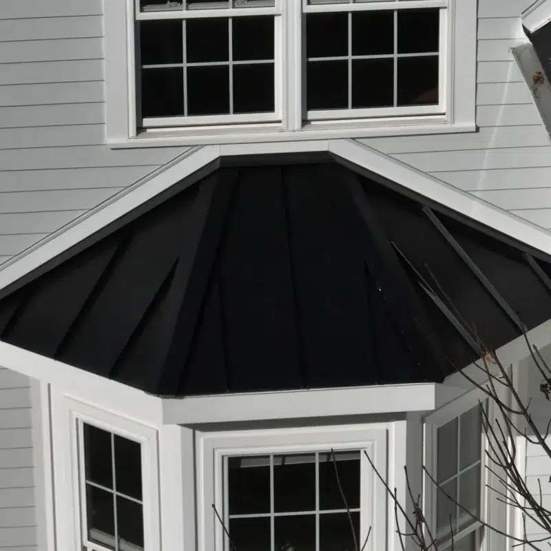 Aerial view of new professional siding services in Hudson, MA by Golden Group Roofing.