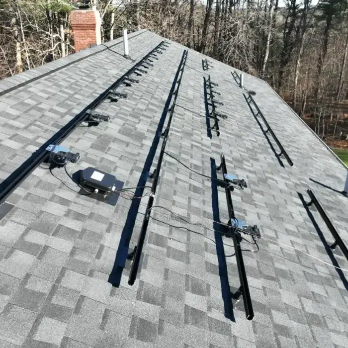 Foundation setup on a slanted shingled roof for a Home Solar Upgrade in Westborough, MA