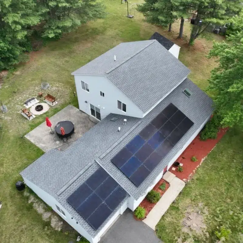 Aerial view of a Home Solar Upgrade rooftop on a residential homes in Newton, Massachusetts
